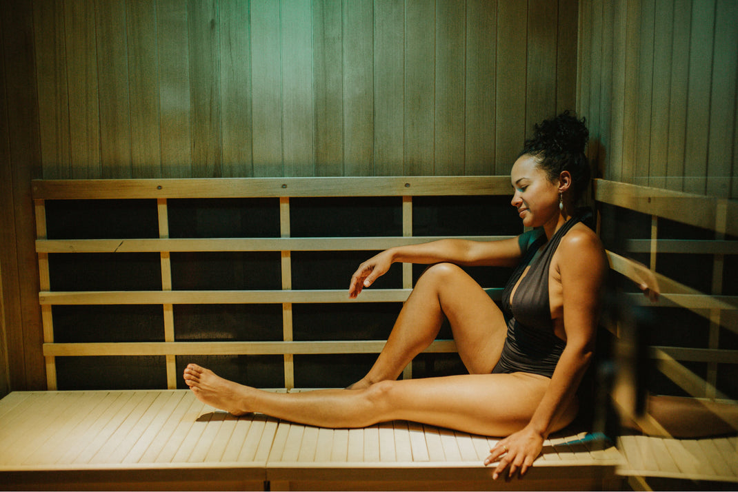 Person lounging in a private sauna at Sauna House